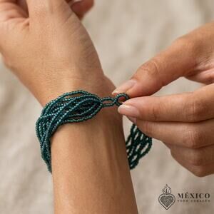 Mexican hand made bracelet  one of a kind  s-med -lg size 8 x 1. IN    00